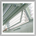 Hinged light fixtures for ease of cleaning and maintenace.
